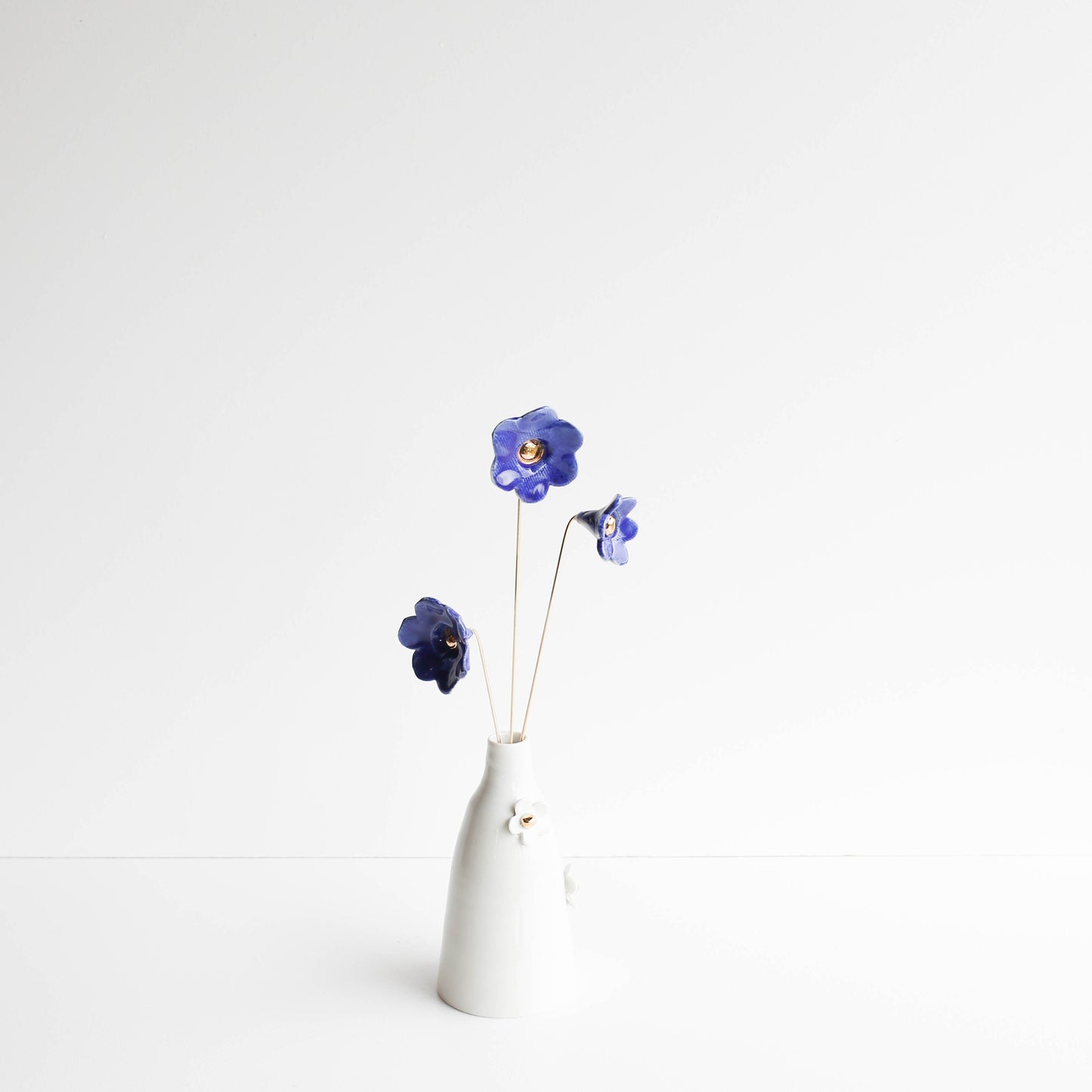 Porcelain Flower set of three on brass wire BLUE