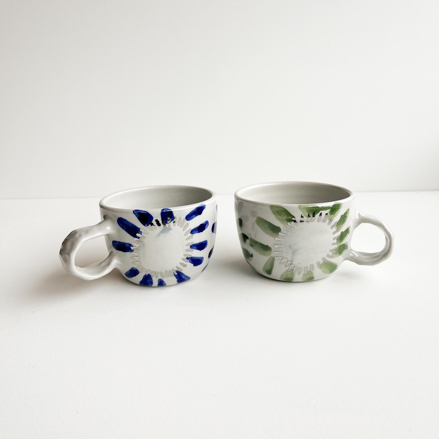 Polly and River silver handle cups