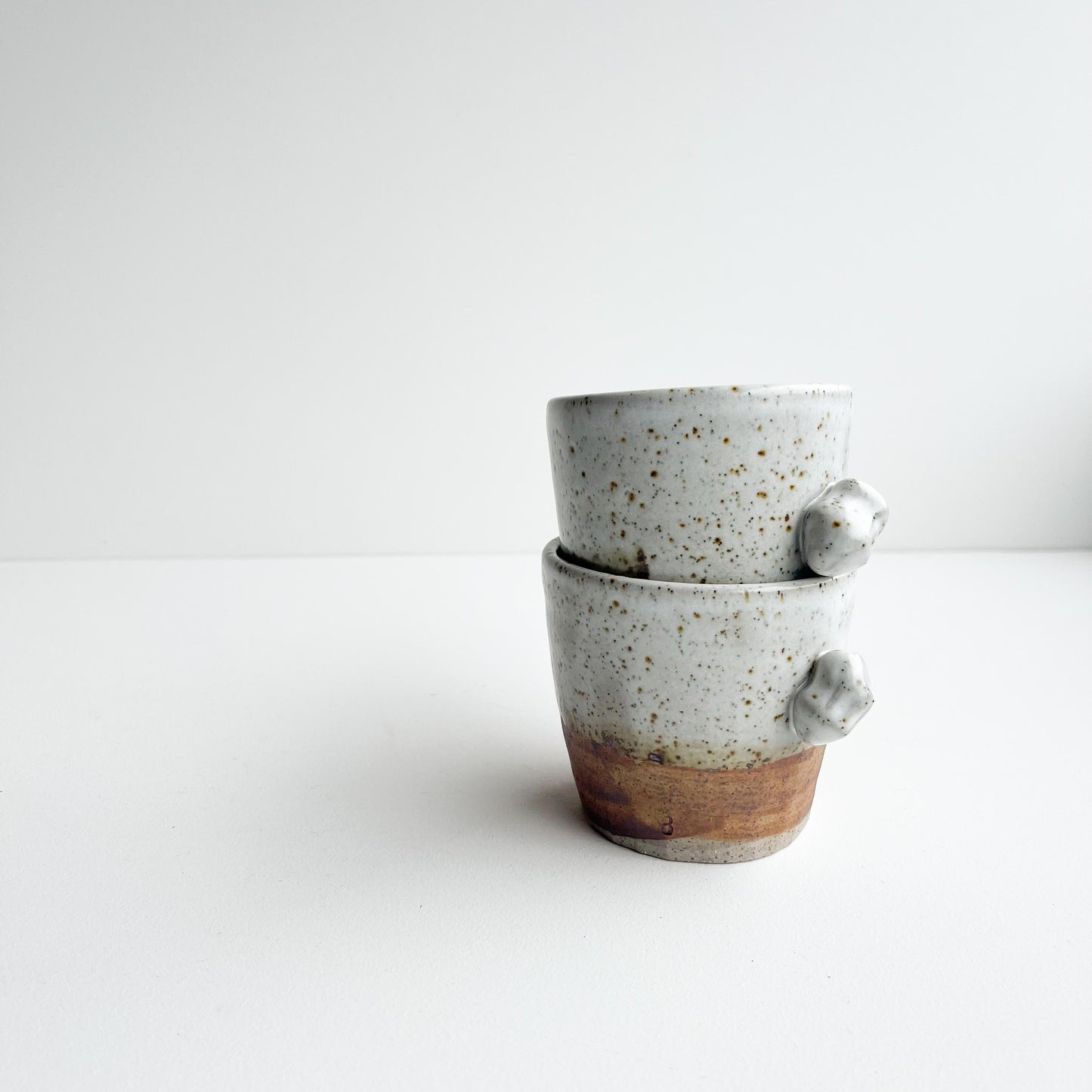 Rick and Red white button cups