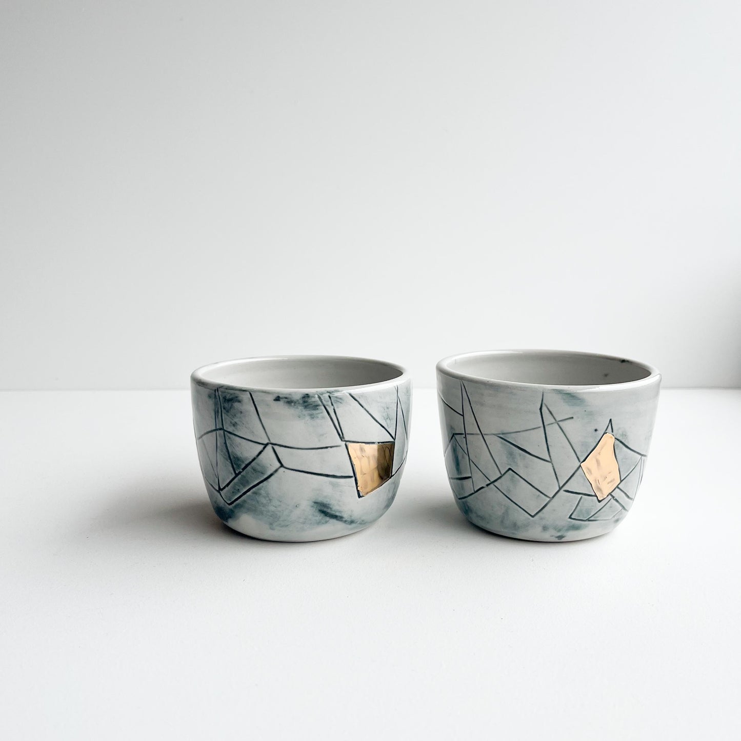 Mia and Aurora gold cups