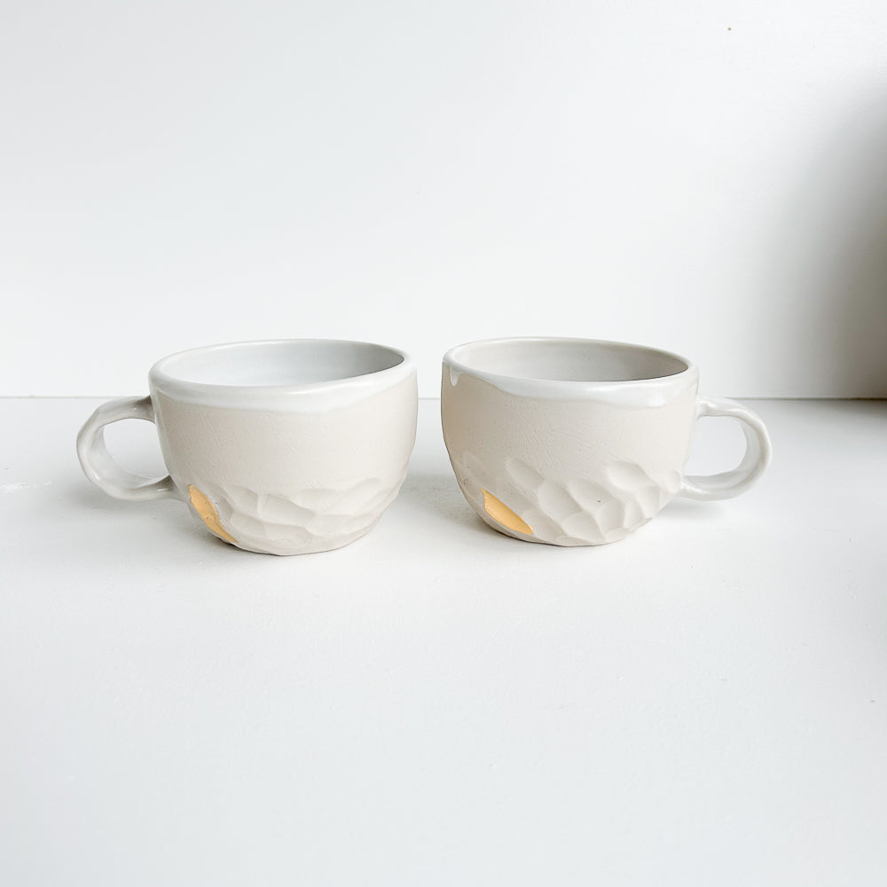 Hand carved cup set