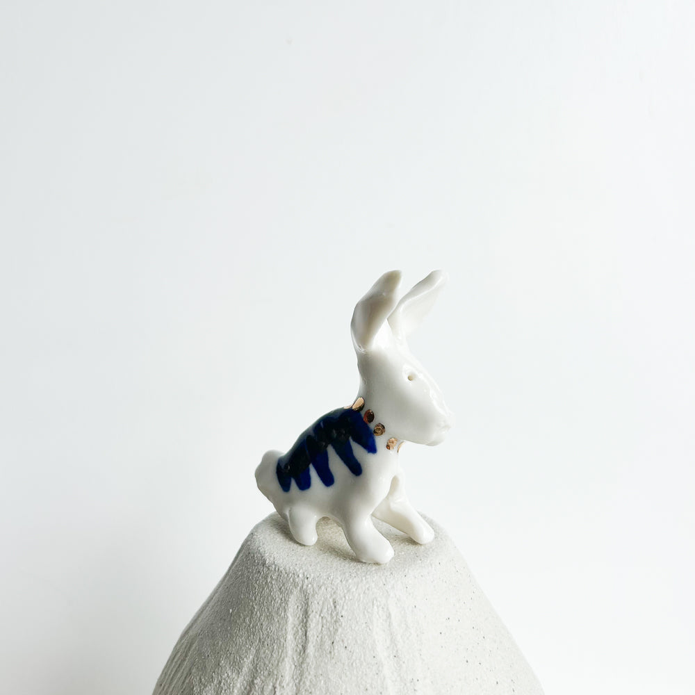 Rabbit Ruffles — soft, fluffy, and delightfully mischievous.