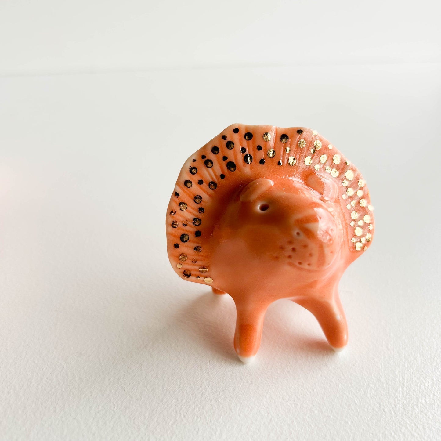 Porcelain Lion small orange GOLD SPOTTY